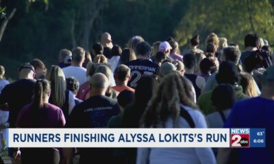 Runners finishing Alyssa Lokits's run