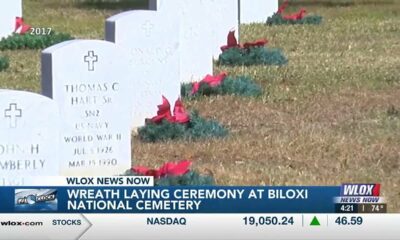 Riemann Family Funeral Home laying wreaths to honor fallen at Biloxi National Cemetery