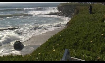 Bystanders rescue driver after car goes over cliff in California