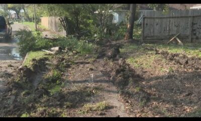 Tow truck crashes into northwest Houston homeowner's fence