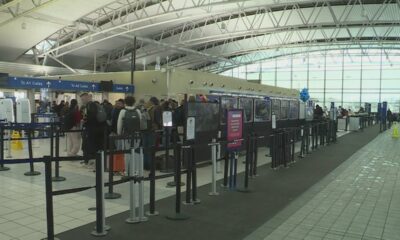 Travelers cope with flight delays, cancellations wrought by winter storm