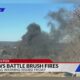 Crews battle brush fires amid red flag warning