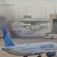 12 hurt after American Airlines plane catches fire at Denver airport