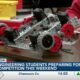 Biloxi High School engineering and robotics students preparing for competition