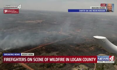 Firefighters on the scene of wildfire in Logan County