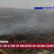 Firefighters on the scene of wildfire in Logan County